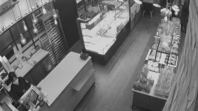 A black and white photo of a store