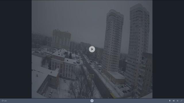 Фотография города, сделанная с веб-камеры