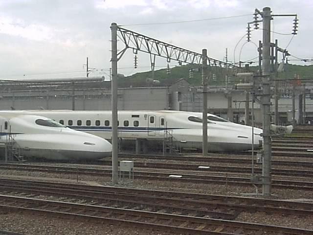 A couple of trains that are sitting on the tracks