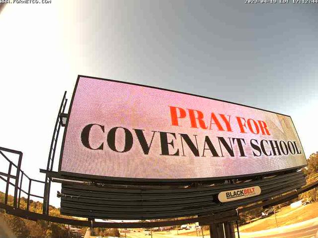A large sign that says pray for covenant school