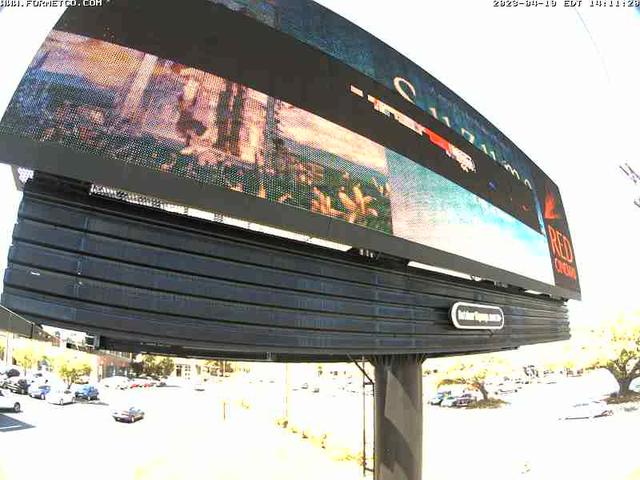 A large billboard with a picture of a city on it