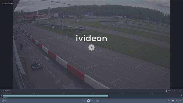 Скриншот гоночной трассы с надписью videon.