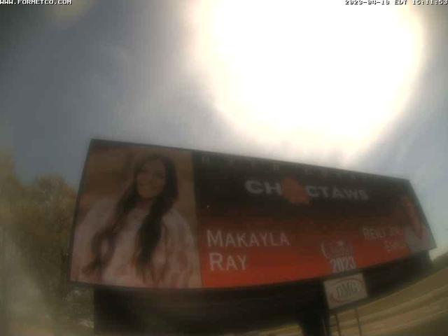 A billboard with a picture of a woman on it