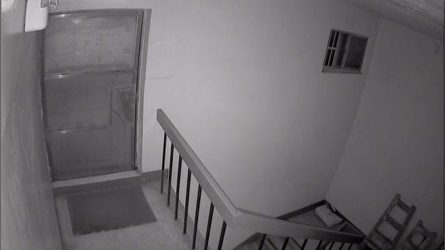A black and white photo of a staircase