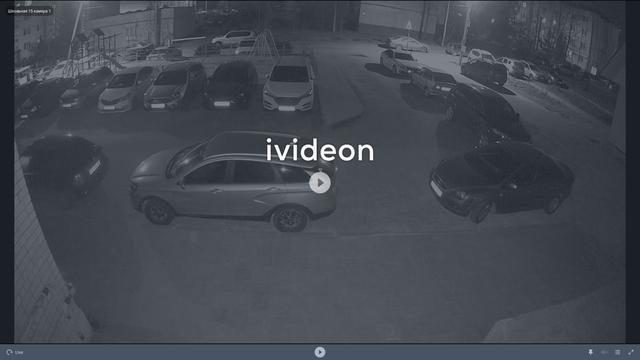 Скриншот двух автомобилей, припаркованных на стоянке