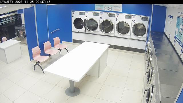 A laundry room with a washer and dryer