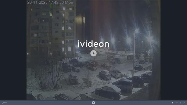 A screen shot of a parking lot with cars parked in it