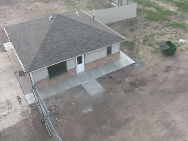 An aerial view of a house in the middle of nowhere