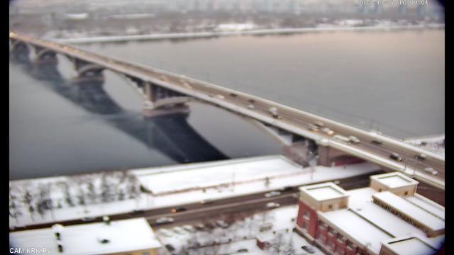 An aerial view of a bridge over a body of water