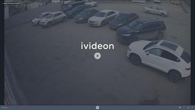 A screen shot of a parking lot with cars parked in it