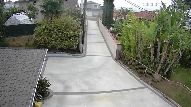 A view of a driveway from above the house