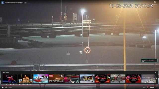 Изображение ночной пристани с веб-камеры