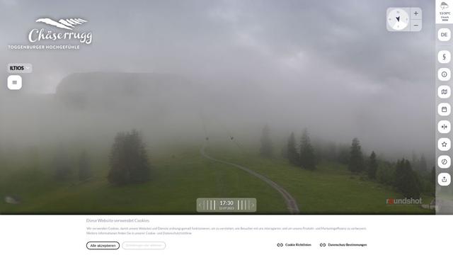 A web page with a picture of a foggy mountain