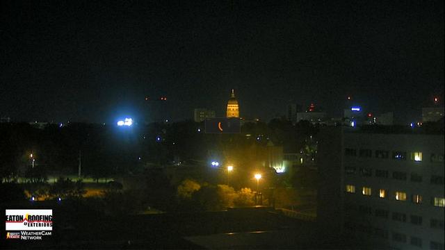 A picture of a city skyline with buildings in the background