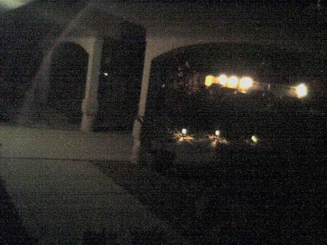 A blurry photo of a house at night