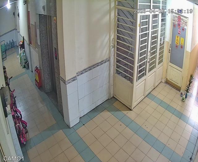 A panoramic view of a hallway with a bunch of closets