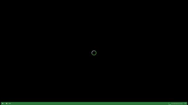 A black screen with a green dot on it