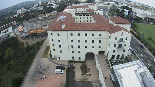 An aerial view of a large white building