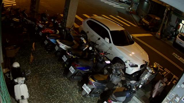 A group of motorcycles parked next to each other