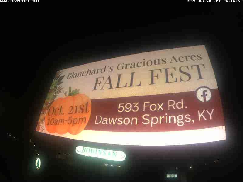 A billboard for farmers bank on the side of a building