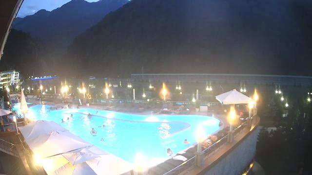A view of a swimming pool at night