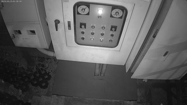 A black and white photo of a control panel
