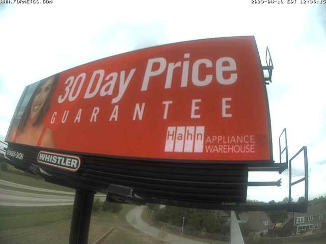 A large red sign advertising a 30 - day price