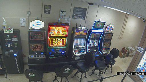 A row of slot machines sitting next to each other